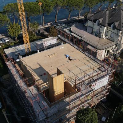 Overview of a multi-story building site with cross-laminated timber elements 