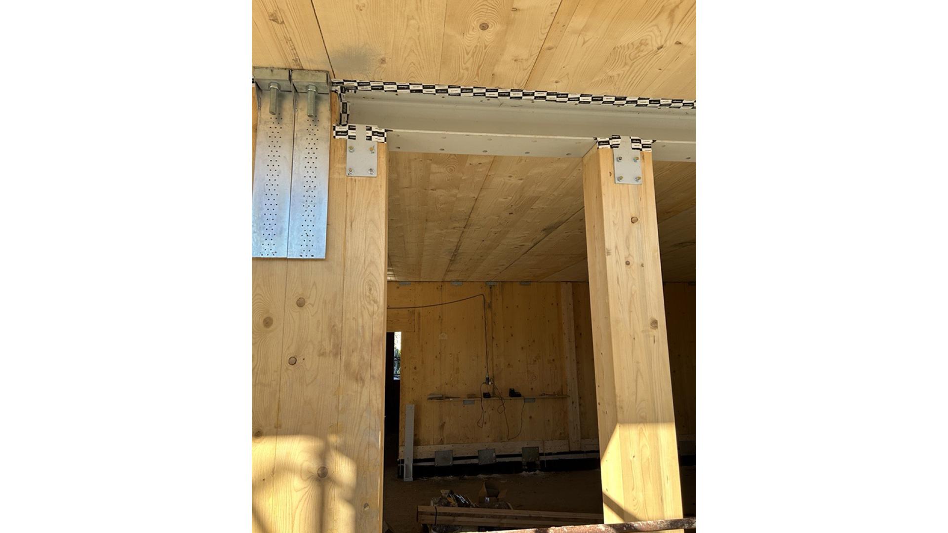 Airtightness tape in building site with cross-laminated timber elements
