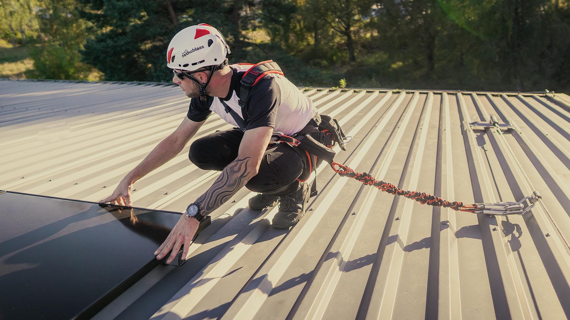 photovoltaic maintenance on a metal roof