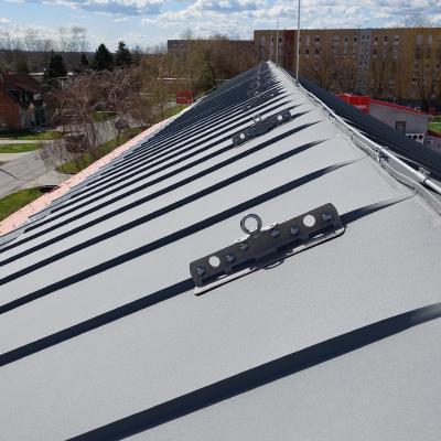 Standing seam metal roof with anchor point for safe access