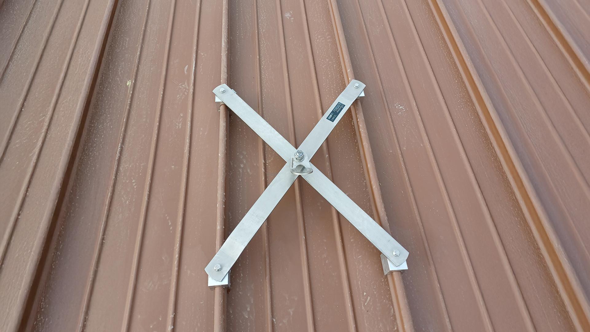 Standing seam metal roof with certified anchor points for fall protection