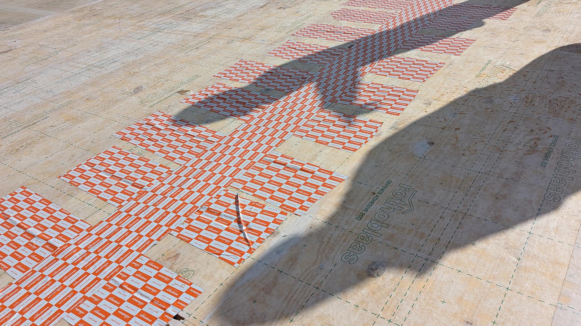 Royalty Studios, SMART BAND sealing joints on CLT floor