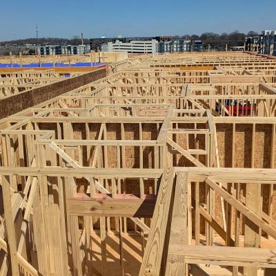 Timber frame in residential construction showing wall assembly with insulation layers 