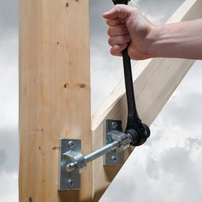 GEKO MINI puller used to align a beam-to-column joint in a timber frame structure