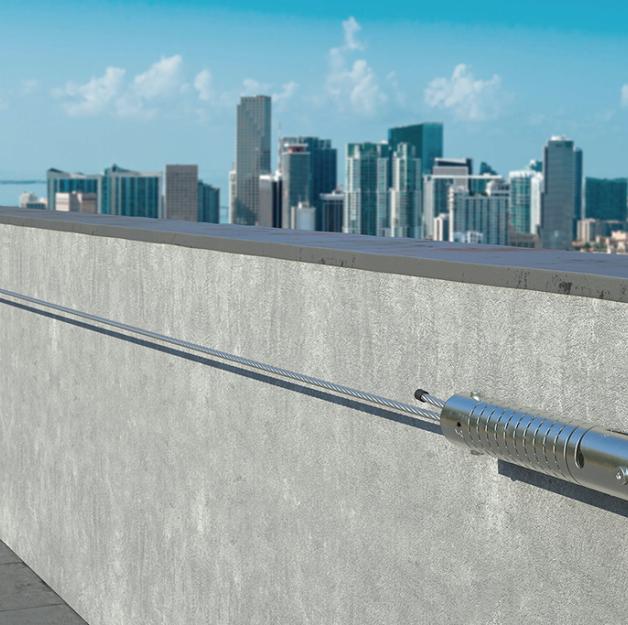 Engineered horizontal lifeline anchor installed on concrete parapet roof for fall protection