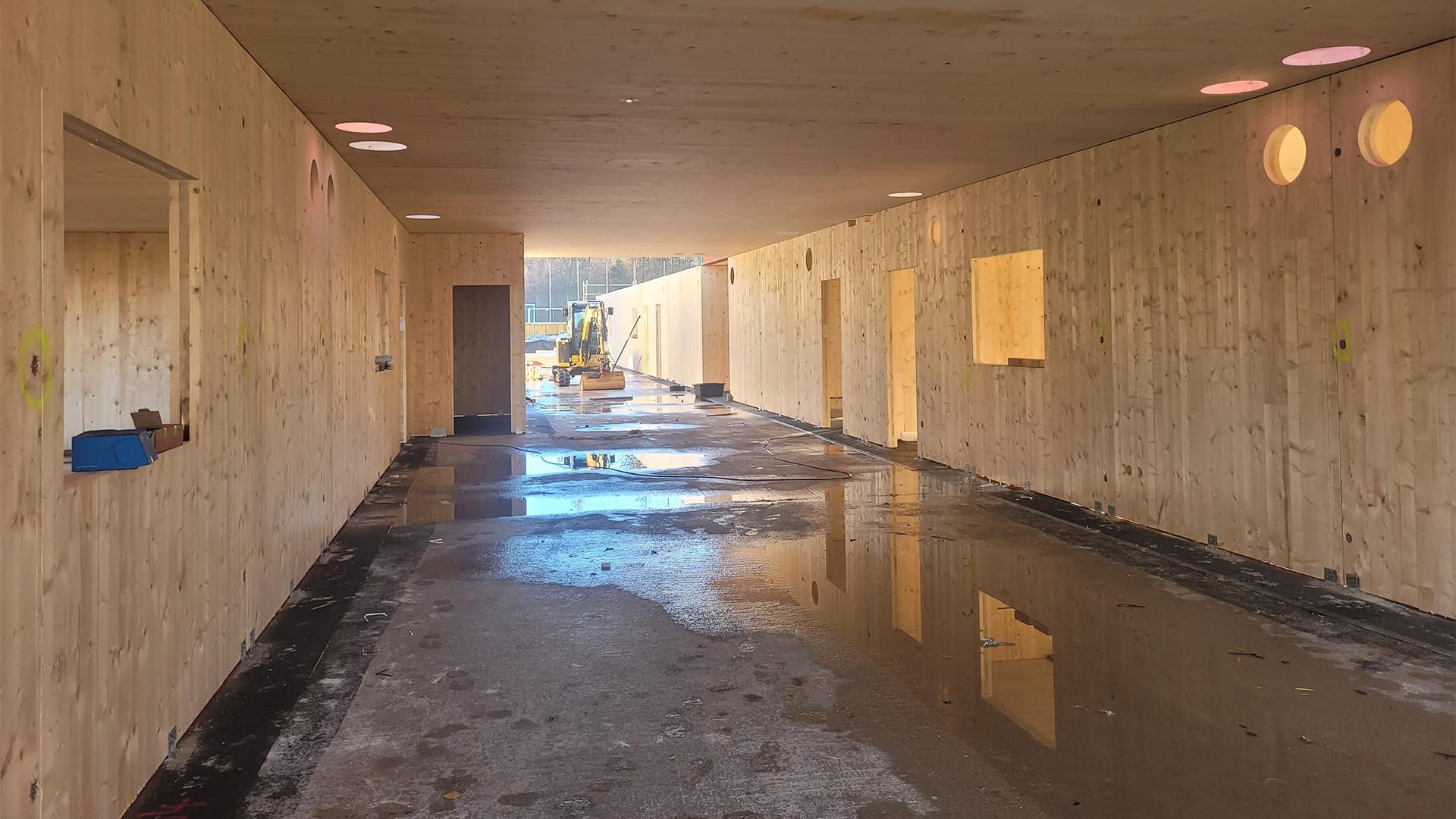 Prefabricated CLT  being assembled on site for a public school building