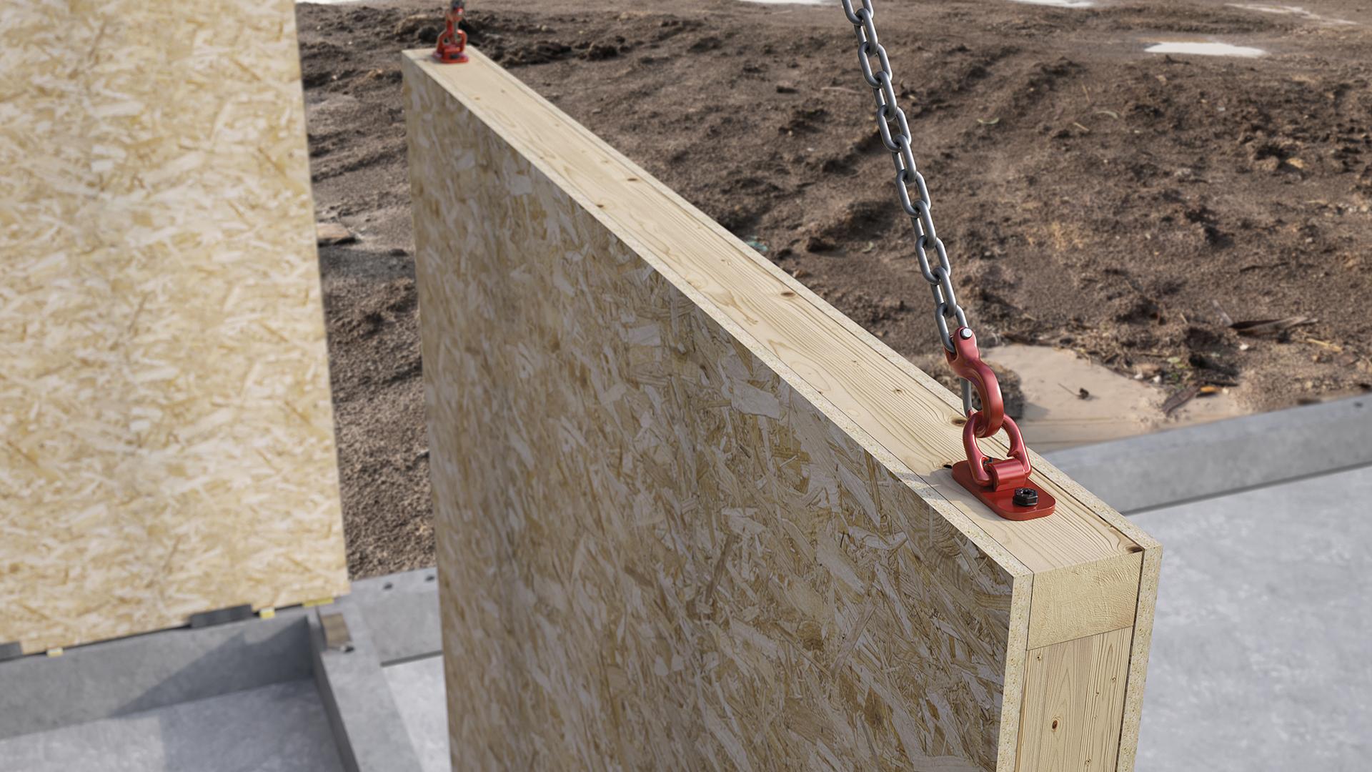 Lifting prefabricated timber wall panels on site using crane and mechanical lifting systems for wooden prefabricated buildings 