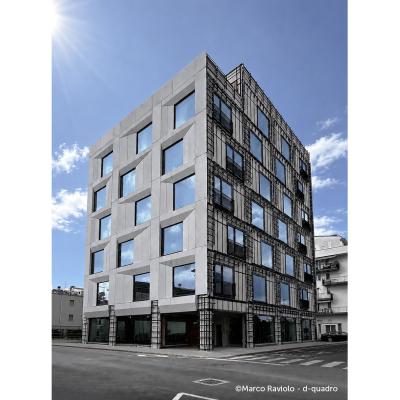 Prefabricated facade retrofit on existing building showing installation phases and building envelope transformation