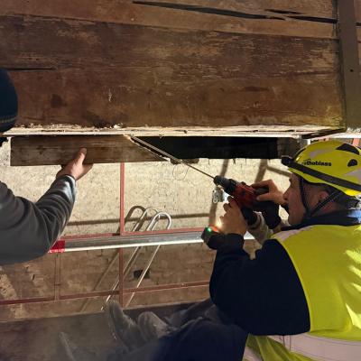 Structural reinforcement work on historic timber trusses at Teatro Farnese, Palazzo della Pilotta, Parma — using Rothoblaas VGS full-thread structural screws.