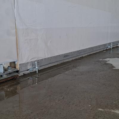 ALU START profile protecting timber panel base from rising damp on site
