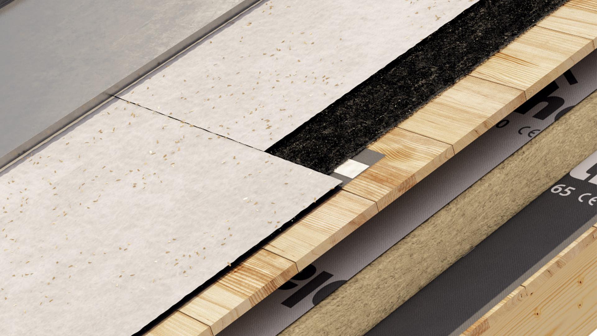 Vapor control membrane installation on a flat timber roof — white fiber-reinforced membrane over mineral wool insulation and CLT structural timber panels, Rothoblaas.