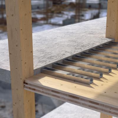 Precast reinforced concrete cantilever balcony slabs resting on X-LAM floors between timber columns in a multi-storey timber building, with steel WHTVG900 connectors visible on the timber slab.