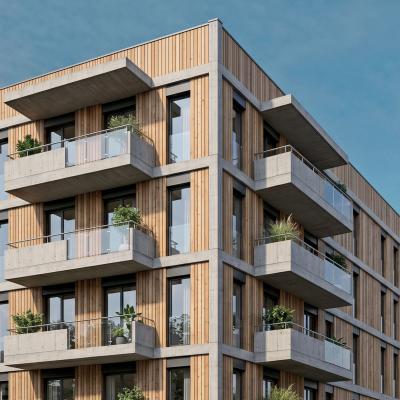Multi-storey residential building with a timber façade and reinforced concrete cantilever balconies with metal railings, surrounded by trees.